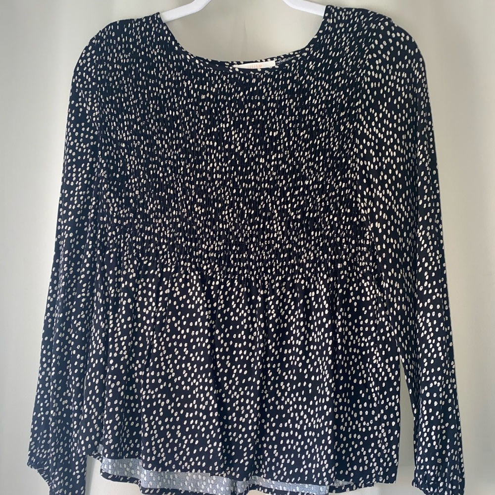 Smocked top and flowy bottom blouse. Great work top.